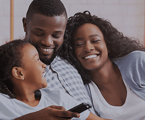 an image of a happy family using Azulle home entertainment