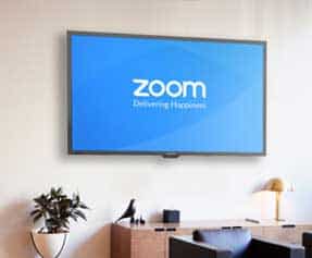 Zoom app on a big monitor on wall