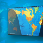 A digital timepiece with a world map and an Azulle Mini PCs.